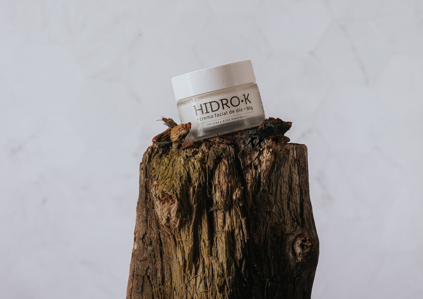 Kénos Hydro-K Day Cream displayed in a natural Patagonian-inspired setting – clean skincare backed by science.